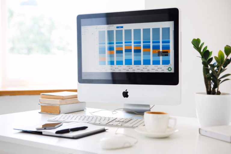 Marketing analytics dashboard showing SEO and PPC data on a laptop