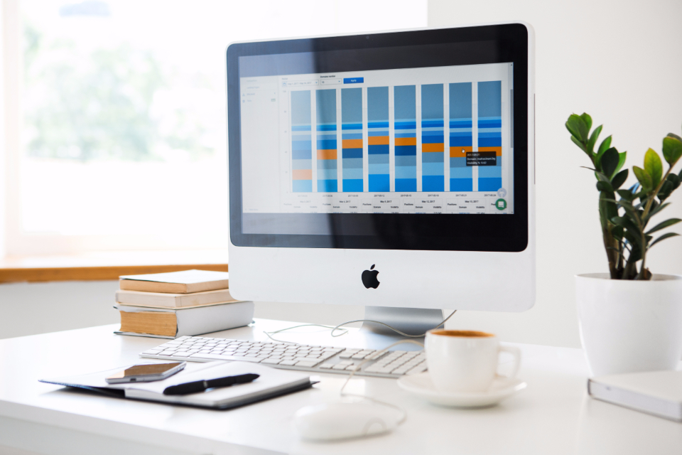 Marketing analytics dashboard showing SEO and PPC data on a laptop